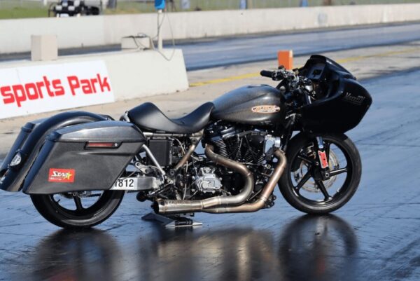 A motorcycle parked on the side of a road.