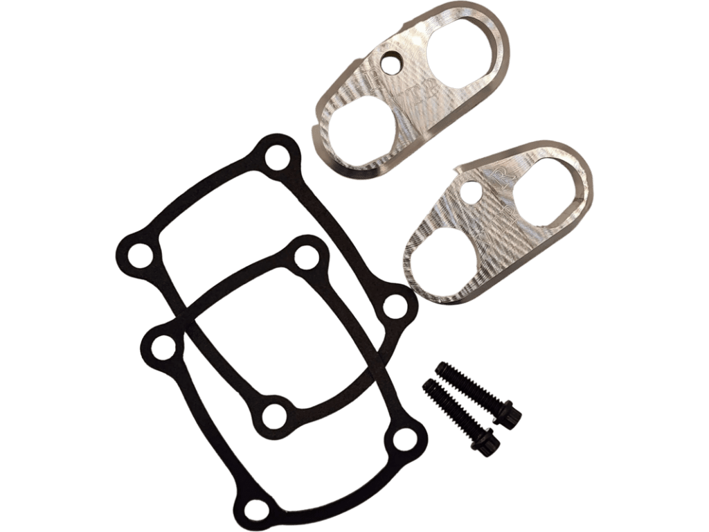 A pair of metal handles and two gaskets.
