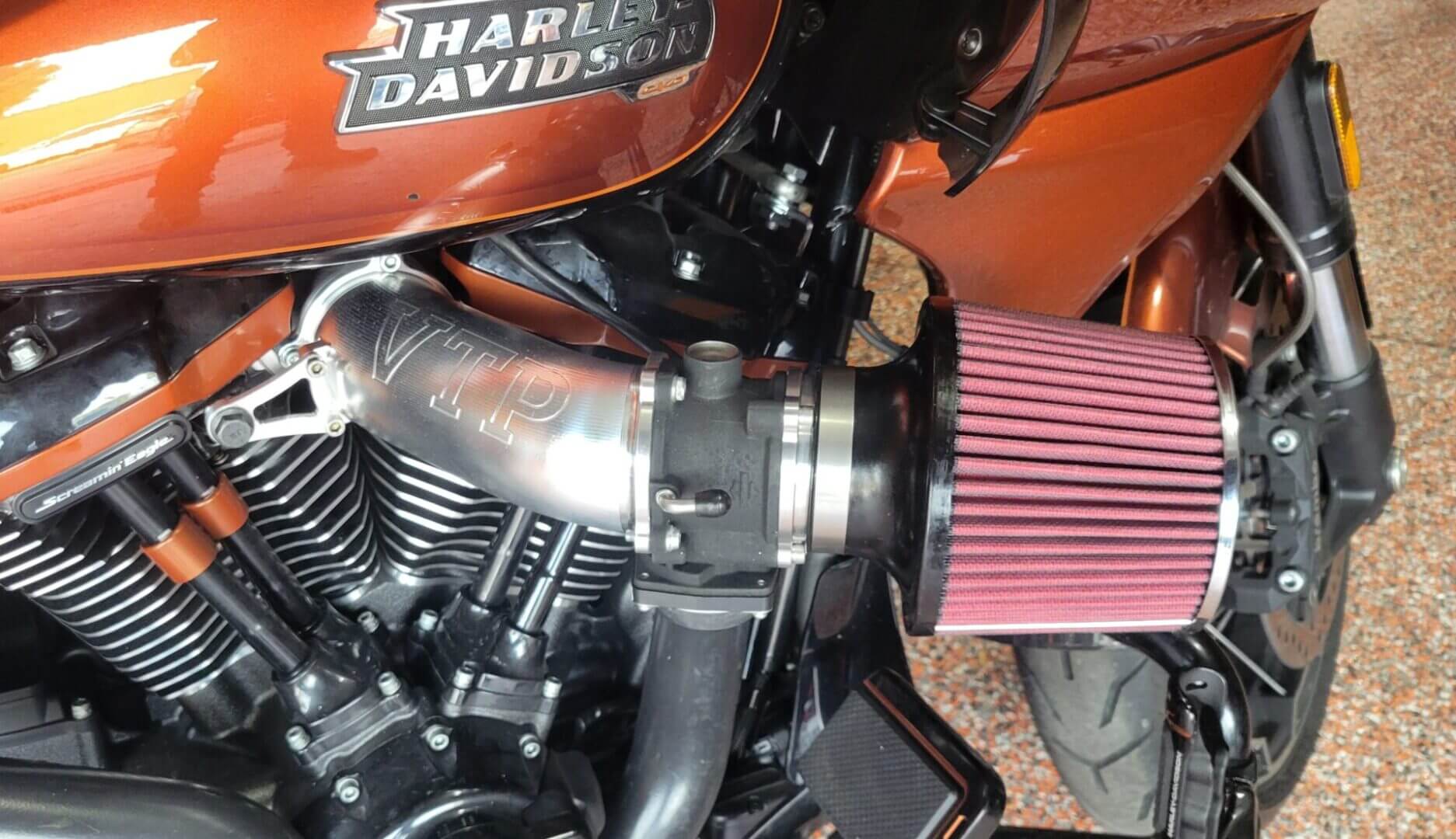Harley Davidson motorcycle engine with air filter.